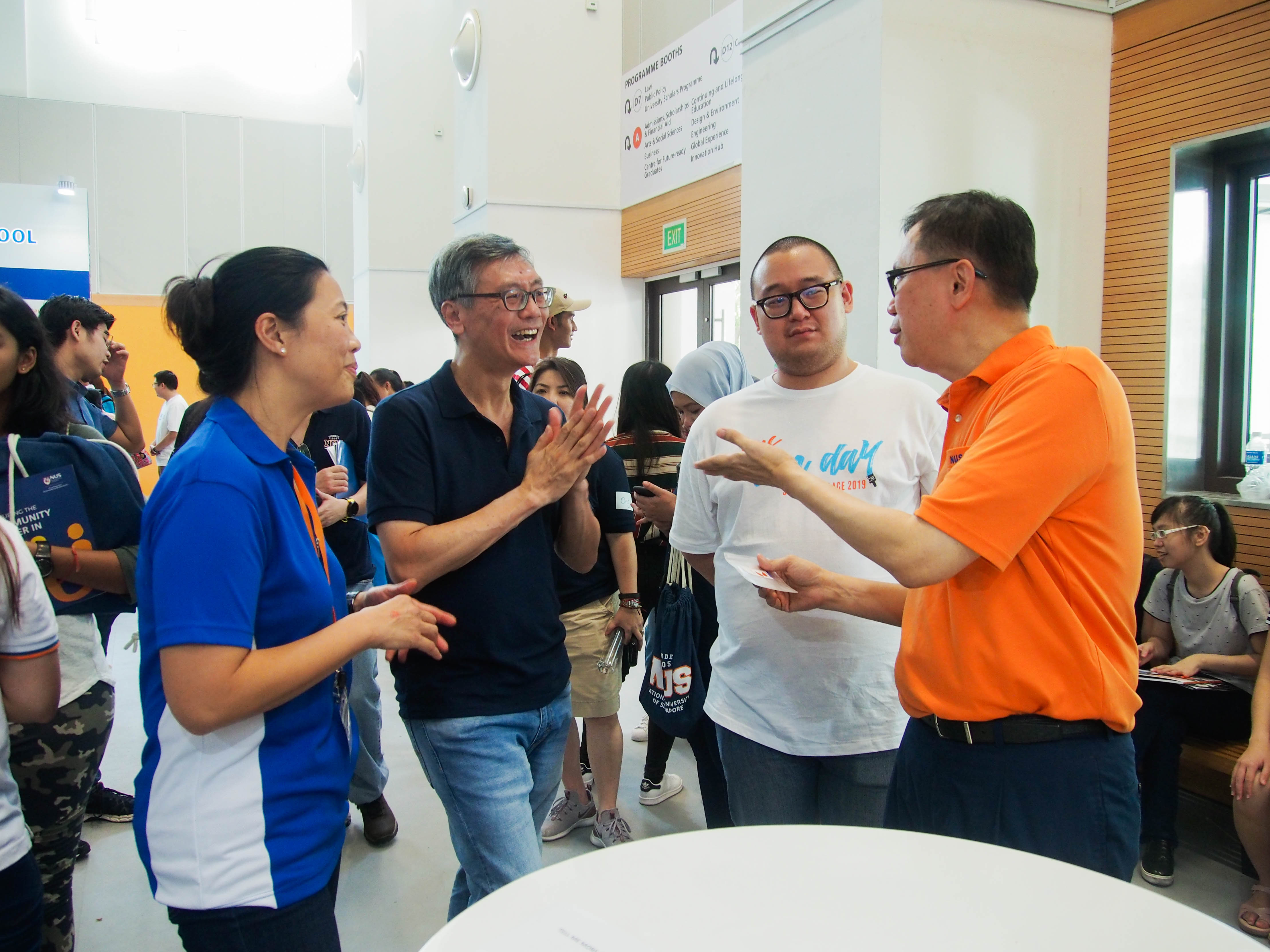 A/Prof Jeannette Lee with Prof Tan Eng Chye, NUS President and Prof Ho Teck Hua, NUS Senior Deputy President and Provost (1st from right) at the SSHSPH Booth at NUS Open Day 2019
