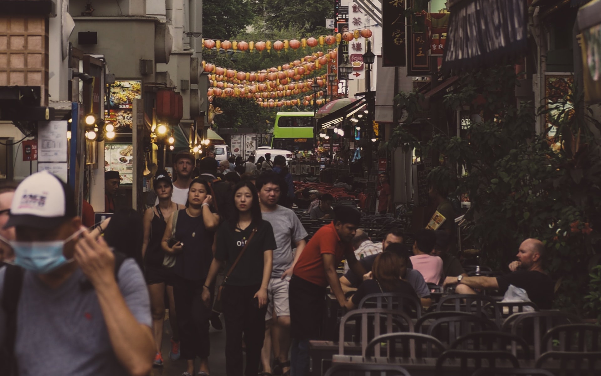 People walking in a narrow street in Singapore