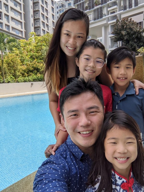 Assistant Professor Clive Tan (front row, first from left) with his family